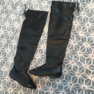 Above knee high black leather boots